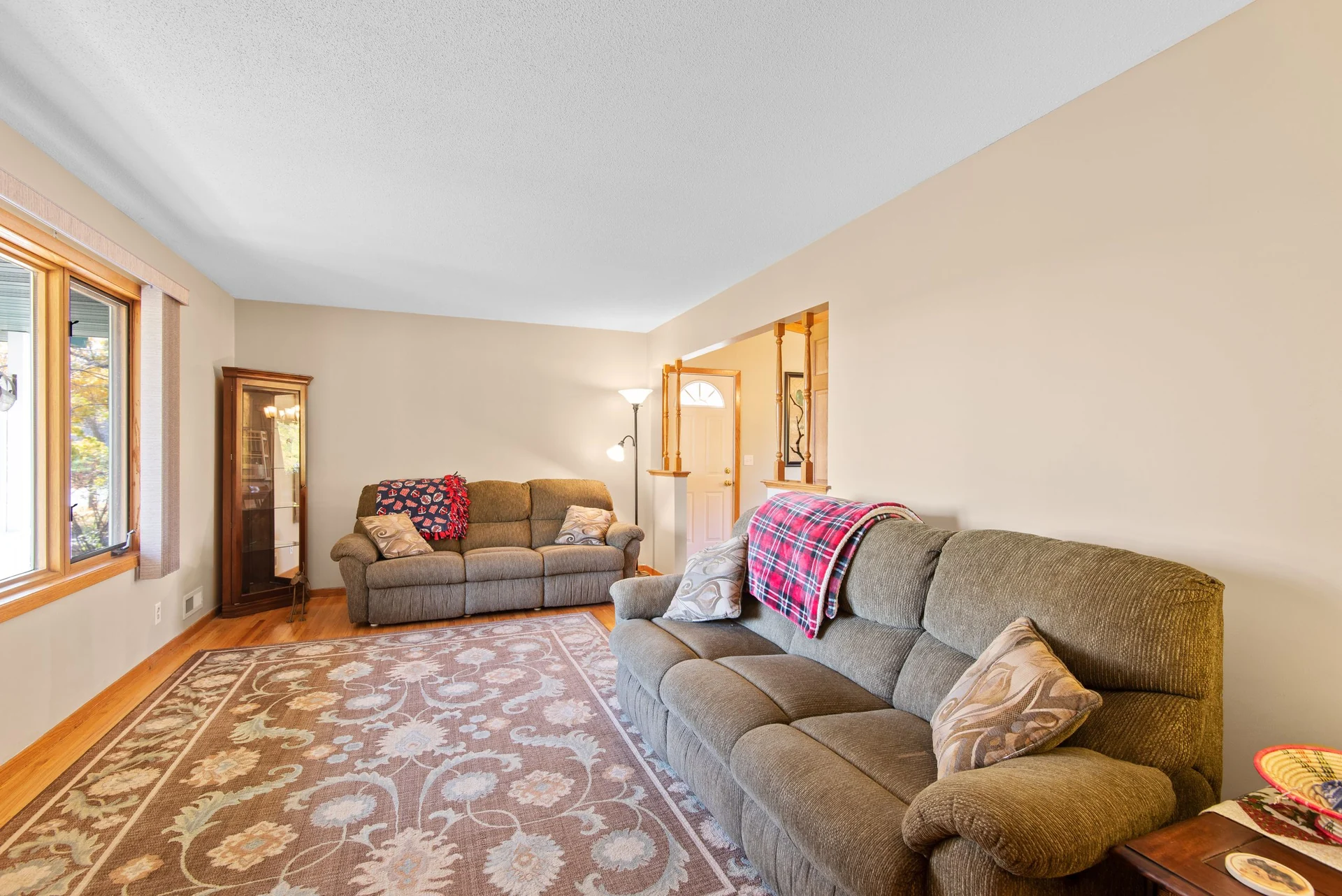 Inviting living room featuring plush sofas and a warm atmosphere.